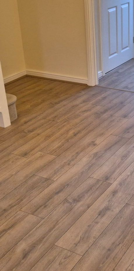 Quickstep Laminate Flooring fitted in a Lounge, Llanharan